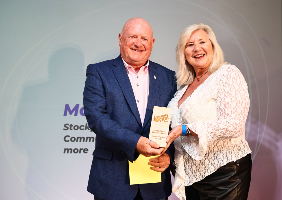 Moz Perkins accepts his Award for Armed Forces Volunteer from Amanda Peers