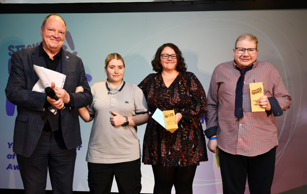 Adam Finch & Gracie Jones accept their Young Volunteer of the Year Award