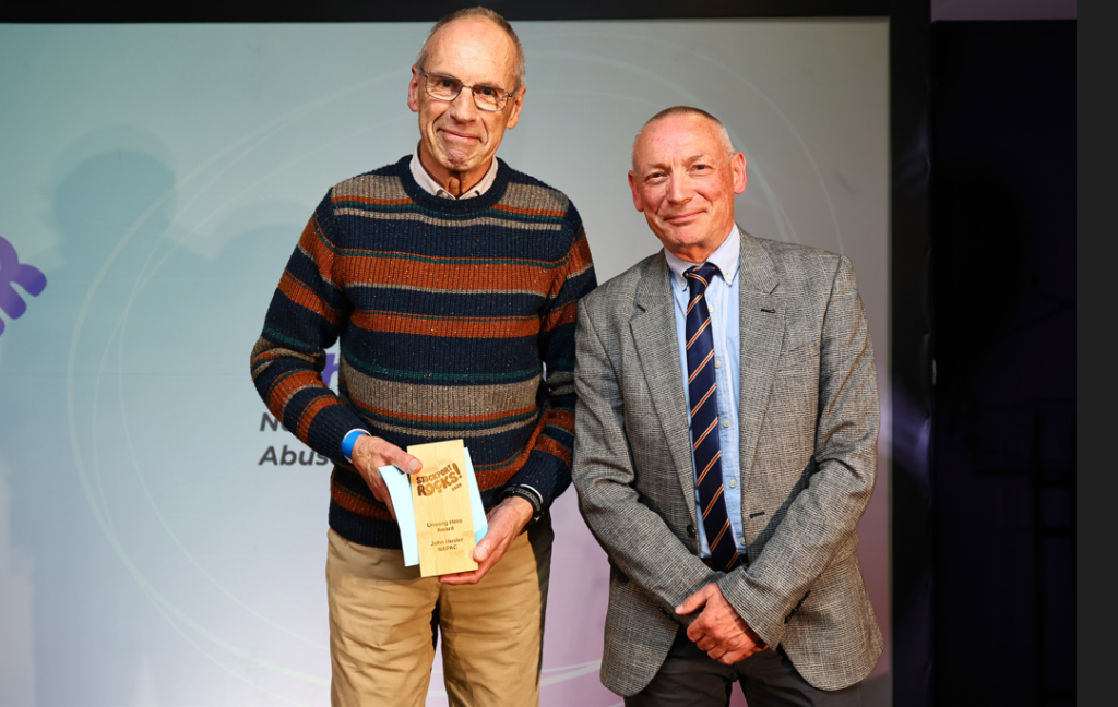 John Hosler accpets his award for Unsung Hero