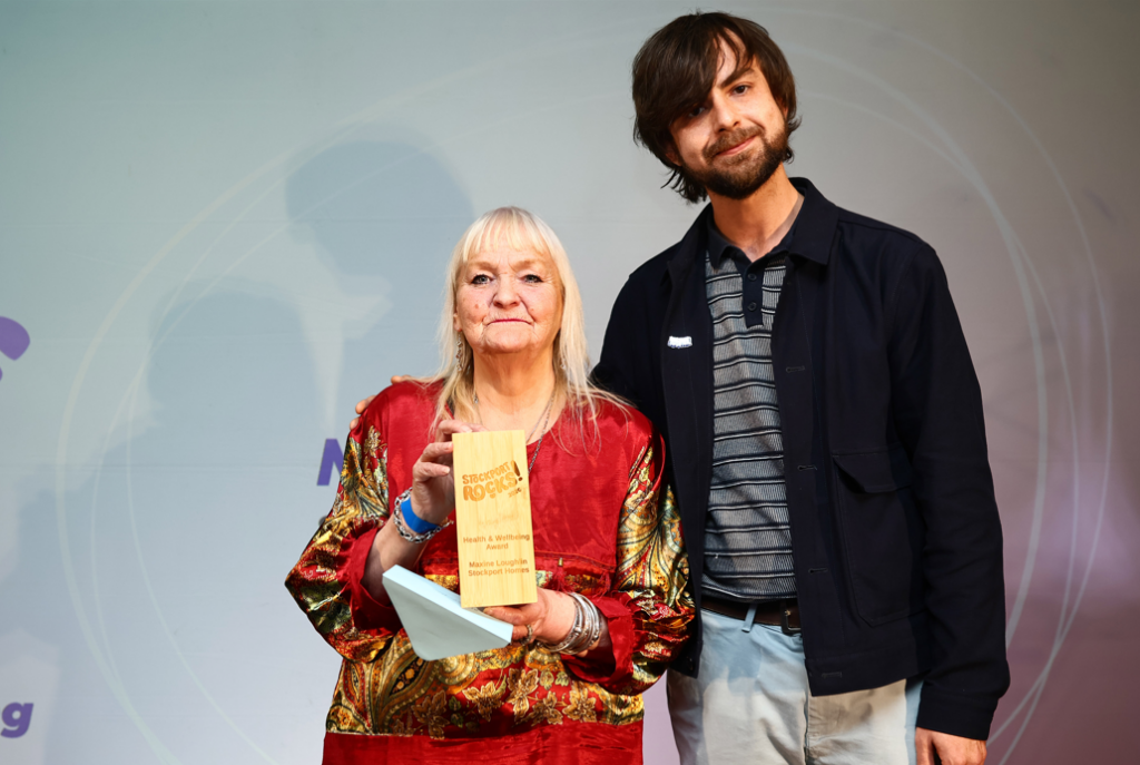 Maxine Loughlin accepts her Award for Health & Wellbeing