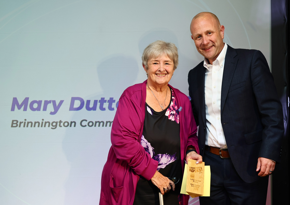 Mary Dutton accepts her Award for Long Service